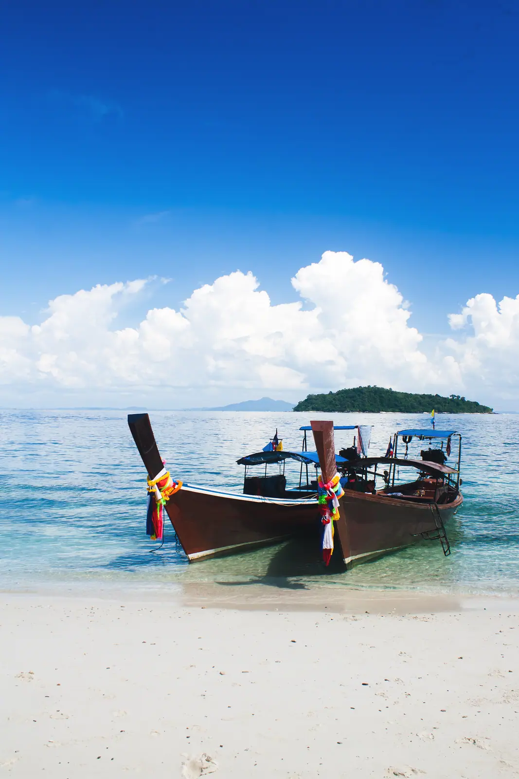 Longtail boats moored off Railay Beach, Krabi